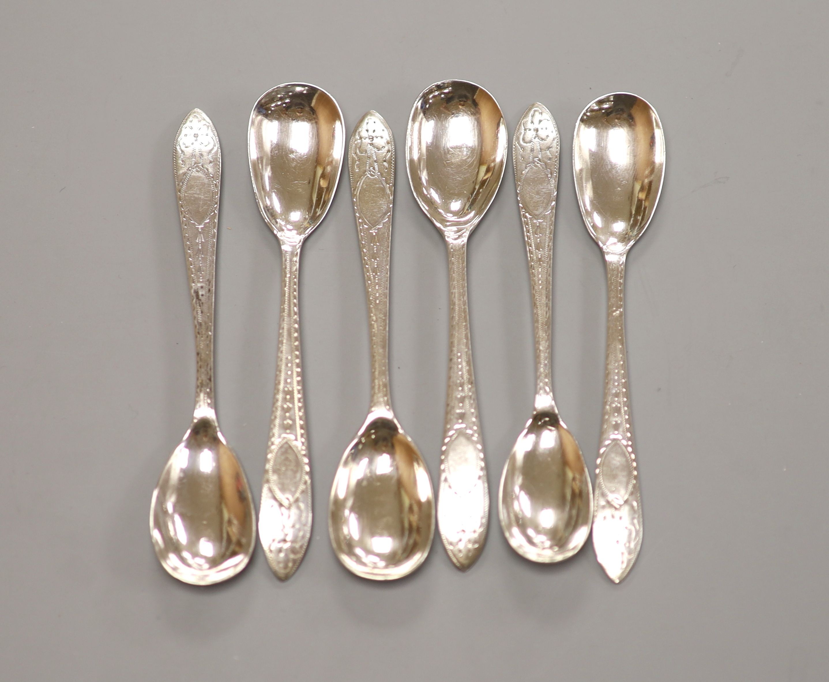 A set of six George III Irish bright cut engraved silver egg spoons, Richard Sawyer, Dublin, 1804, 12.9cm, 92 grams.